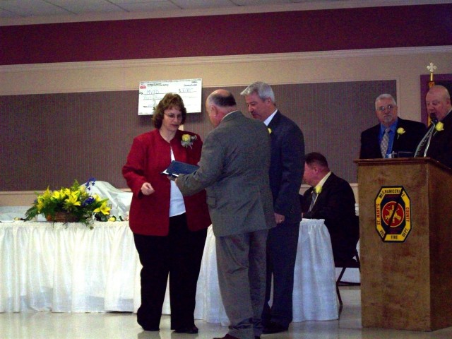 Past President Willie Wilkerson receives his length of service award
